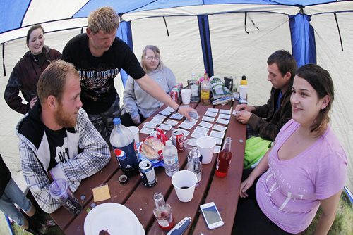 June 29, 2014 - 140629 - (L to R)Vanessa Lavallee, Steven Peters, Michael Van Rooy, Adina Albright, Ryland Naugle and Chantelle Siddle play cards in their tent at the Bird's Hill Park camp site Sunday, June 29, 2014. John Woods / Winnipeg Free Press