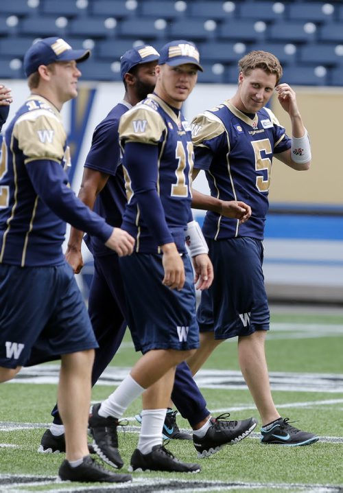 QB #5 Drew Willy and other QB's during prcatice walk through .Blue Bomber light practice , preparing for home game vs the Ottawa Redblacks . July 2 2014 / KEN GIGLIOTTI / WINNIPEG FREE PRESS