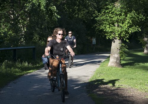 Cyclists enjoy the nice weather and clear skies Wednesday evening at Assiniboine Park. Sarah Taylor