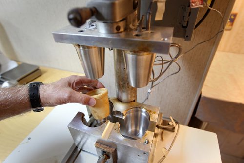 Baker Giuseppe (Joe) Palumbo has created La Tazzina  a edible coffee cup- He shows machine he designed to make the cups- See 49.8 feature- July 02, 2014   (JOE BRYKSA / WINNIPEG FREE PRESS)