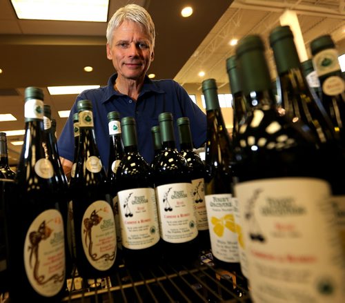 Grant Rigby, owner of Rigby Orchards in Killarney, is the province's only organic liquor producer. MLCC says organic liquor sales are growing at more than 10 per cent annually. Thursday, July 3, 2014. (TREVOR HAGAN/WINNIPEG FREE PRESS)