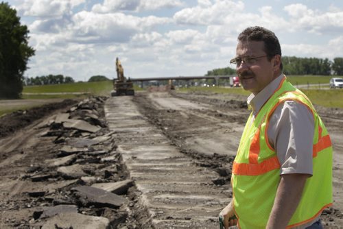 Les Noehre, District Engineer, Grand Forks District, North Dakota Dept. of Transportation at road reconstruction site on I-29 highway about 20 miles south of Grand Forks. Thirty plus year old concrete is being torn up and rubblized for the reconstruction project.   Dan Lett story Wayne Glowacki / Winnipeg Free Press July 3  2014