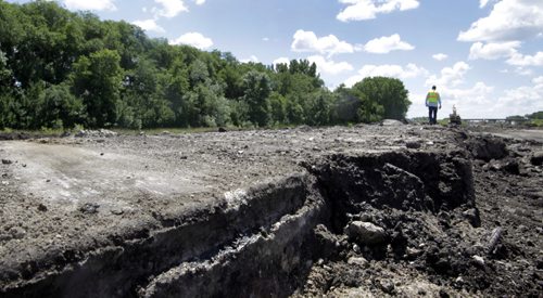 A closeup of the thirty plus year old concrete that is being torn up and rubblized for the reconstruction project.  This road reconstruction site in the north bound lanes on I-29 highway about 20 miles south of Grand Forks.   Dan Lett story Wayne Glowacki / Winnipeg Free Press July 3  2014