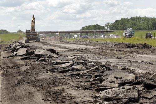 The road reconstruction site on I-29 highway about 20 miles south of Grand Forks. Thirty plus year old concrete is being torn up and rubblized for the reconstruction project.   Dan Lett story Wayne Glowacki / Winnipeg Free Press July 3  2014