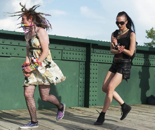 House music fan Jennifer McClune and Amber Solstice dance at the Forks Bridge Party on Saturday. The electronic music festival was hosted by MEMETIC. Sarah Taylor / Winnipeg Free Press July 5th, 2014
