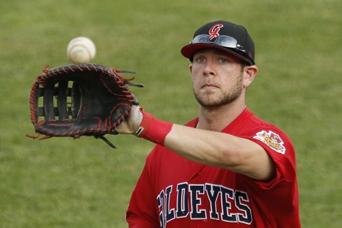 July 8, 2014 - 140708  -  Winnipeg Goldeyes first baseman Casey Haerther (12) snags a throw to first against the Sioux Valley Explorers in Winniepg Monday, July 8, 2014. John Woods / Winnipeg Free Press