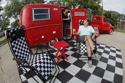 July 8, 2014 - 140708  -  On Monday, July 8, 2014 Kelly Klick and her husband Tom McMahon are photographed with their restored 1975 Boler camper. The 1975 Boler camper is owned by  Kelly Klick and Tom McMahon and was restored by Kelly and her father Jack. John Woods / Winnipeg Free Press
