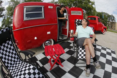 July 8, 2014 - 140708  -  On Monday, July 8, 2014 Kelly Klick and her husband Tom McMahon are photographed with their restored 1975 Boler camper. The 1975 Boler camper is owned by  Kelly Klick and Tom McMahon and was restored by Kelly and her father Jack. John Woods / Winnipeg Free Press