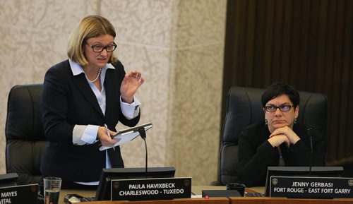 Coun. Paula Havixbeck (left) asks a question while Coun. Jenny Gerbasi listens at a meeting of Winnipeg city council on Wed., July 9, 2014, where members of the forensic auditing team that examined 33 real estate transactions explained and defended their report. Photo by Jason Halstead/Winnipeg Free Press
