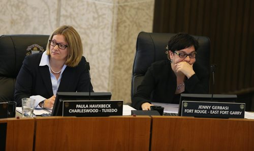 Coun. Paula Havixbeck (left) and Coun. Jenny Gerbasi listen during a meeting of Winnipeg city council on Wed., July 9, 2014, where members of the forensic auditing team that examined 33 real estate transactions explained and defended their report. Photo by Jason Halstead/Winnipeg Free Press
