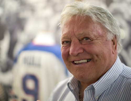 Former Winnipeg Jet Bobby Hull in front of a display of his jersey at the Manitoba Sports Hall of Fame. Former teammates Bobby Hull and Ulf Nilsson visited the Hall of Fame Wednesday.  140709 - Wednesday, July 09, 2014 - (Melissa Tait / Winnipeg Free Press)