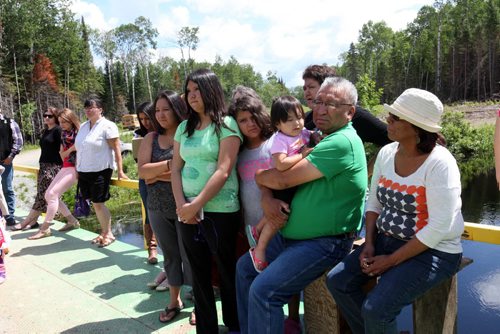 Residents of Shoal Lake 40 First Nation take part in event marking the 100th anniversary for the flooding of their land to provide water for the City of Winnipeg.  The flood disconnected them from the mainland except in the winter when the temporary bridge they are on connects them via a winter road.   See Mary Agnes story. July 09, 2014 Ruth Bonneville / Winnipeg Free Press