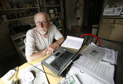 John Woods / Winnipeg Free Press / July 17/07- 070717  - Winnipeg senior Harry Paine takes a break from his writing to be photographed in the kitchen of his apartment Tuesday July 17/07.   Paine spends most of his income on his apartment rent. seniors baby boomers