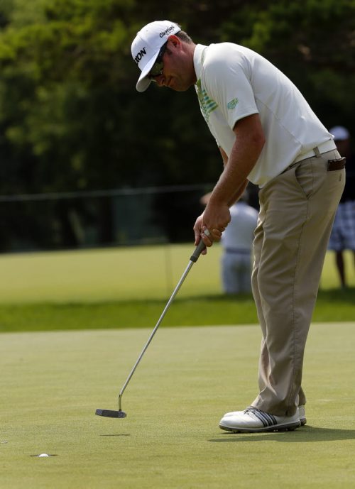Eric Barnes making short putt on 18 , he is one of the leaders  on the first day of  The Players Cup at Pine Ridge July 10 2014 / KEN GIGLIOTTI / WINNIPEG FREE PRESS