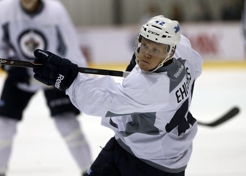 Jets top poc Nikolaj Ehlers  take s shot during scrimmage .SPORTS - Winnipeg Jets Development Camp scrimmaged in front of a standing room  crowd at the MTS Iceplex   Story by Ed Tait . July 11 2014 / KEN GIGLIOTTI / WINNIPEG FREE PRESS
