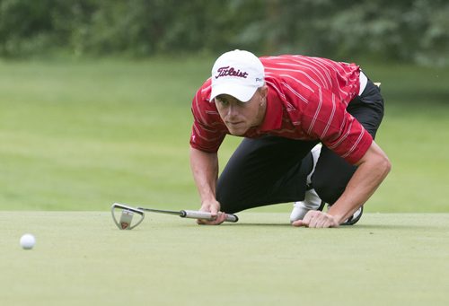 Timothy Madigan, from Las Croces, New Mexicoshouts a birdie on the 15th hole. Madigan leads Saturday's game at Pine Ridge Golf Club. Sarah Taylor / Winnipeg Free Press July 12, 2014