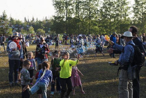Kids flock to the bubbles at Folk Fest on Saturday. Sarah Taylor / Winnipeg Free Press July 12 2014