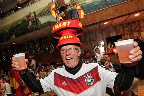 Irv Koch and a few hundered other fans celebrate Germany's World Cup win over Argentina at the Germany Club on Flora Ave Sunday afternoon.  140713 - Sunday, July 13, 2014 -  (MIKE DEAL / WINNIPEG FREE PRESS)