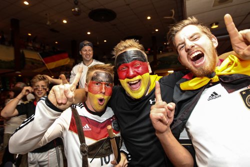 Fans celebrate Germany's World Cup win over Argentina at the Germany Club on Flora Ave Sunday afternoon.  140713 - Sunday, July 13, 2014 -  (MIKE DEAL / WINNIPEG FREE PRESS)