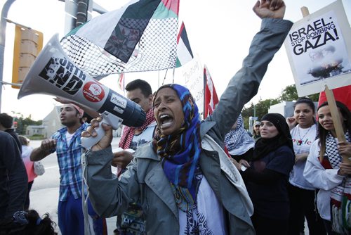 July 14, 2014 - 140714  -  Palestinian supporters hold a peaceful rally at the Manitoba Legislature Monday, July 14, 2014. John Woods / Winnipeg Free Press