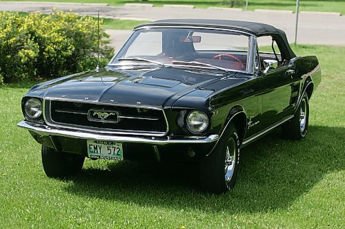 BORIS MINKEVICH / WINNIPEG FREE PRESS 070708 Louis Grimaud has a black '67 Mustang convertible, 57,000 original miles on it. Car was in storage from Sept. 86 to Aug. 2006. The 289 V8 has had a full rebuild with many performance parts.