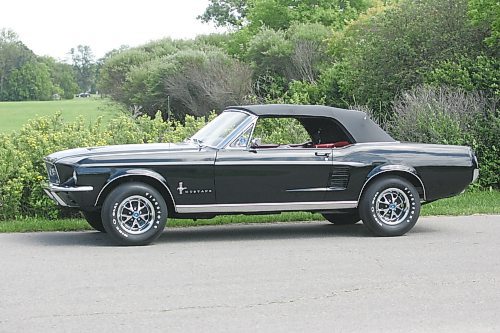 BORIS MINKEVICH / WINNIPEG FREE PRESS  070708 Louis Grimaud has a black '67 Mustang convertible, 57,000 original miles on it.  Car was in storage from Sept. 86 to Aug. 2006. The 289 V8 has had a full rebuild with many performance parts.