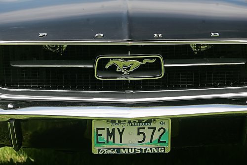 BORIS MINKEVICH / WINNIPEG FREE PRESS 070708 Louis Grimaud has a black '67 Mustang convertible, 57,000 original miles on it. Car was in storage from Sept. 86 to Aug. 2006. The 289 V8 has had a full rebuild with many performance parts.