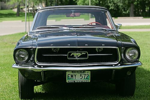BORIS MINKEVICH / WINNIPEG FREE PRESS 070708 Louis Grimaud has a black '67 Mustang convertible, 57,000 original miles on it. Car was in storage from Sept. 86 to Aug. 2006. The 289 V8 has had a full rebuild with many performance parts.