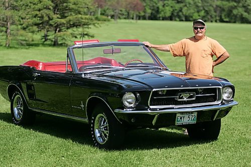 BORIS MINKEVICH / WINNIPEG FREE PRESS  070708 Louis Grimaud has a black '67 Mustang convertible, 57,000 original miles on it.  Car was in storage from Sept. 86 to Aug. 2006. The 289 V8 has had a full rebuild with many performance parts.