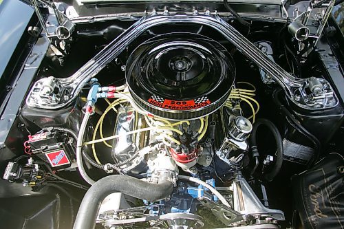 BORIS MINKEVICH / WINNIPEG FREE PRESS 070708 Louis Grimaud has a black '67 Mustang convertible, 57,000 original miles on it. Car was in storage from Sept. 86 to Aug. 2006. The 289 V8 has had a full rebuild with many performance parts.