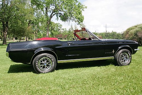 BORIS MINKEVICH / WINNIPEG FREE PRESS  070708 Louis Grimaud has a black '67 Mustang convertible, 57,000 original miles on it.  Car was in storage from Sept. 86 to Aug. 2006. The 289 V8 has had a full rebuild with many performance parts.