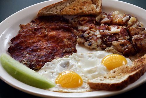 ENT - restaurant review - Dawning 3277 Portage ,ownersin some photos  LtoR Tram  and Luat Nguyen  with  food dishes  in photo  gloms kuak  (breakfast eggs) .July 15 2014 / KEN GIGLIOTTI / WINNIPEG FREE PRESS
