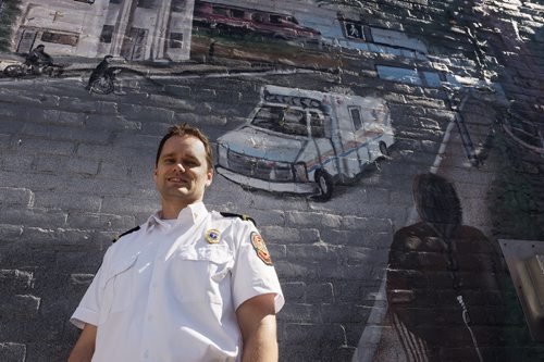 Paramedic Ryan Sheath, 33, has won the award of excellence for innovative technology for his work with HIV testing and treating at Main Street Project on Martha Street. Sarah Taylor / Winnipeg Free Press July 15, 2014