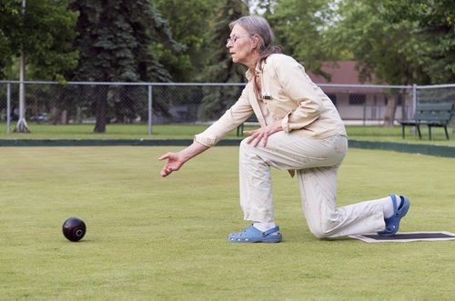 Janice Cardigan plays lawn bowling at St. John's park on Wednesday evening, she likes to come out to play three times a week. Sarah Taylor / Winnipeg Free Press July 16, 2014