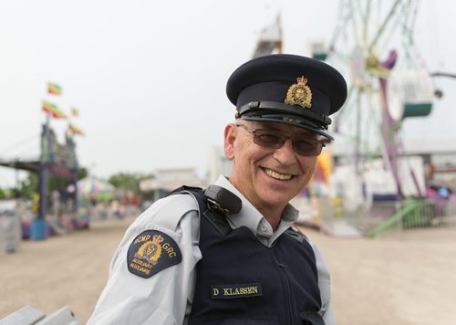 RCMP officer Don Klassen has lived in Morris his life and has been working at the Morris Stampede for 10 years. He says the stampede has been getting smaller each year. Sarah Taylor / Winnipeg Free Press July 17, 2014