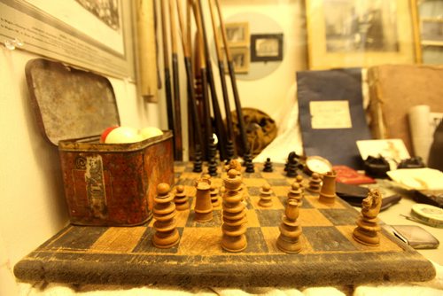 Chess set, golf balls and other household items on display in the Sipiweske Museum in Wawanesa Manitoba .   Oriole Vane Veldhuis, author of For Elise, who has rescurrected the Criddle - Vane story with her research and depiction of Criddle's mistress Else Vane who was actually engaged to Criddle for  but who he never married.  49er feature on the Criddle family the park is named after. Percy Criddle, a somewhat wealthy merchant, arrived from London in 1882 with his wife and four children, and his German mistress Else and their five children.  They homesteaded in this weird arrangement, passing off his mistress as a widow who worked as the family maid. The provincial park still carries many of their effects, although vandals torched the home  about two weeks ago. Homestead is near Shilo Manitoba.  See Bill Redekop story.   July 16, 2014 Ruth Bonneville / Winnipeg Free Press