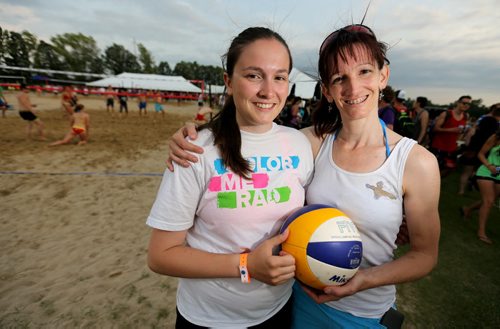 Mica Rosier, 18, and her mom, Rona, at the Super-Spike volleyball tournament at Maple Grove Rugby Park, Friday, July 18, 2014. (TREVOR HAGAN/WINNIPEG FREE PRESS) - for melissa martin story