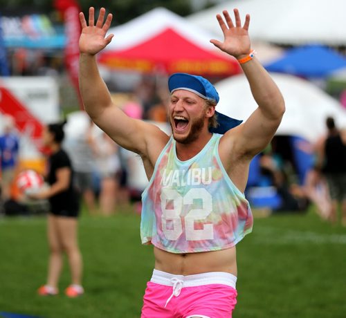 A member of Poppin Volley's celebrates a point at the Super-Spike volleyball tournament at Maple Grove Rugby Park, Friday, July 18, 2014. (TREVOR HAGAN/WINNIPEG FREE PRESS)