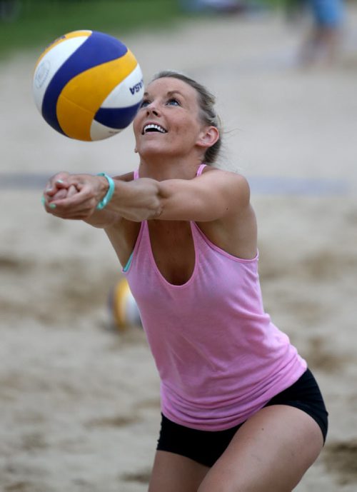 Brittany Balcewich of City Kitties warms up at the Super-Spike volleyball tournament at Maple Grove Rugby Park, Friday, July 18, 2014. (TREVOR HAGAN/WINNIPEG FREE PRESS)