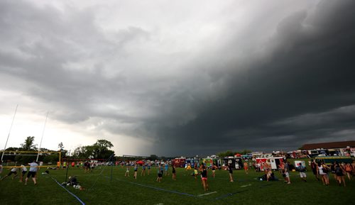 Storm clouds above Super-Spike volleyball tournament at Maple Grove Rugby Park, Friday, July 18, 2014. (TREVOR HAGAN/WINNIPEG FREE PRESS)