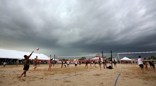 Storm clouds above Super-Spike volleyball tournament at Maple Grove Rugby Park, Friday, July 18, 2014. (TREVOR HAGAN/WINNIPEG FREE PRESS)