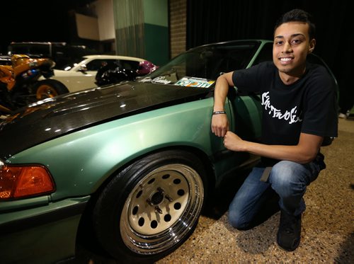 Michael Sumar and his turbocharged 1991 Honda Civic at Winnipeg Speed Fest at the Winnipeg Convention Centre, Saturday, July 19, 2014. (TREVOR HAGAN/WINNIPEG FREE PRESS)