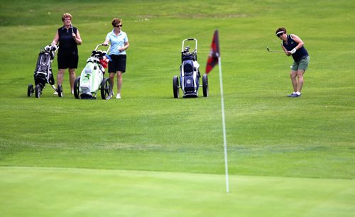 Golfers on the 9th hole at the Wildwood Club, Sunday, July 20, 2014. (TREVOR HAGAN/WINNIPEG FREE PRESS)