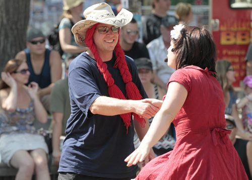 July 20, 2014 - 140720  -  Mathieu Dureau, who was pulled from the audience, performs with Lizzie in Lizzie And The Ladderman at The Winnipeg Fringe Festival Sunday, July 20, 2014. John Woods / Winnipeg Free Press