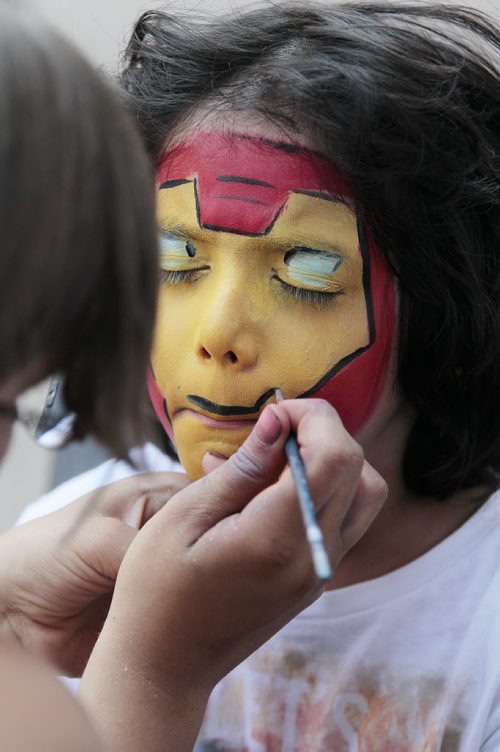 July 20, 2014 - 140720  -  Sahil Kibria gets his face painted at The Winnipeg Fringe Festival Sunday, July 20, 2014. John Woods / Winnipeg Free Press