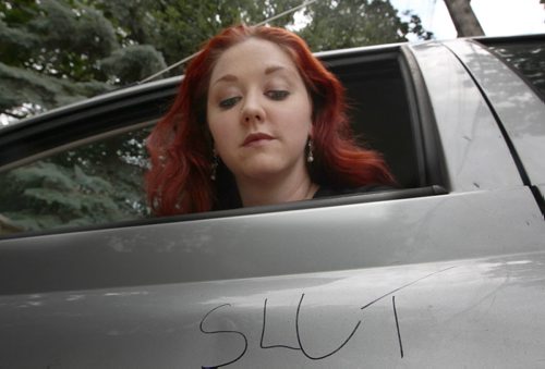 Theresa Thompson and her car that was defaced with slut- Someone is trying to intimidate her and shut down her Fringe show called -Lies of a Promiscuous Woman -See Gordon Sinclair Story- July 21, 2014   (JOE BRYKSA / WINNIPEG FREE PRESS)