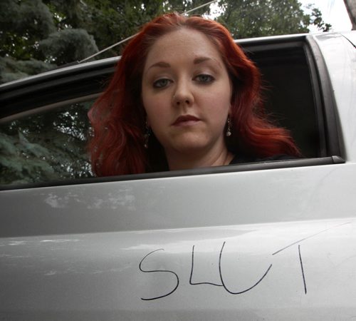 Theresa Thompson and her car that was defaced with slut- Someone is trying to intimidate her and shut down her Fringe show called -Lies of a Promiscuous Woman -See Gordon Sinclair Story- July 21, 2014   (JOE BRYKSA / WINNIPEG FREE PRESS)