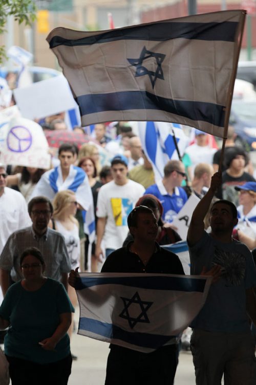 July 21, 2014 - 140721  -  About 100 Israel supporters gather for a rally on Main Street Winnipeg Monday, July 21, 2014. John Woods / Winnipeg Free Press