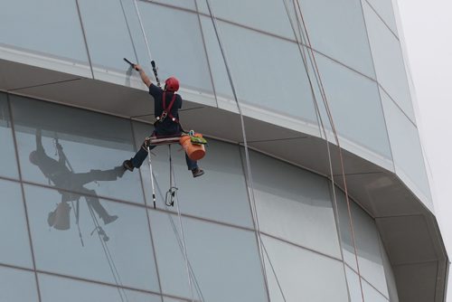 July 21, 2014 - 140721  -  Window cleaner puts a shine on the Canadian Museum for Human Rights Monday, July 21, 2014. John Woods / Winnipeg Free Press