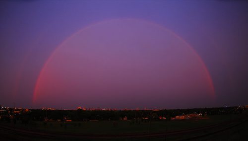 July 21, 2014 - 140721  -  A strange rainbow phenomenon was seen opposite a sunset from Winnipeg's Westview Park, a.k.a. "Garbage Hill" Monday, July 21, 2014.  John Woods / Winnipeg Free Press